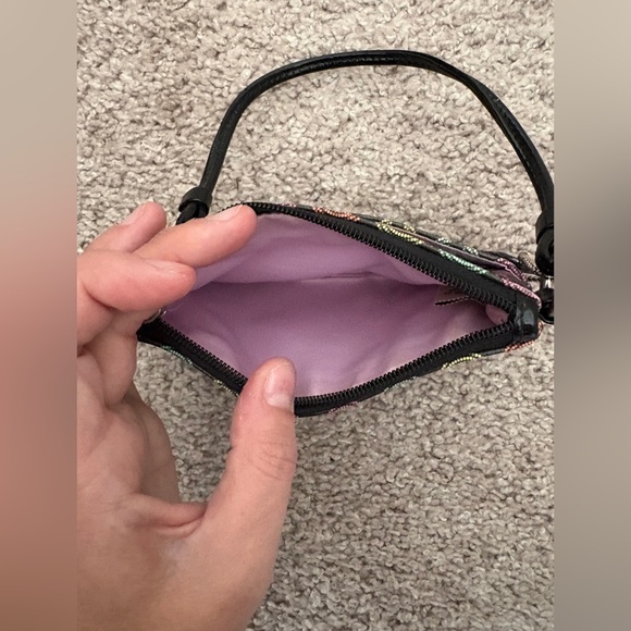 Coach small black and colorful wristlet 6” x 4” zipper.  Gently used - Picture 4 of 6